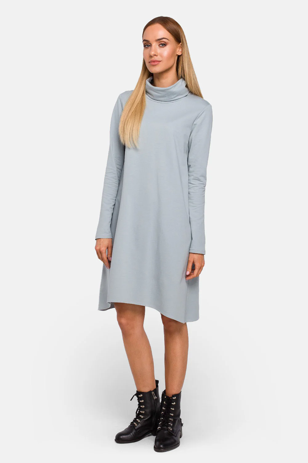 Model wearing a dove turtle neck dress